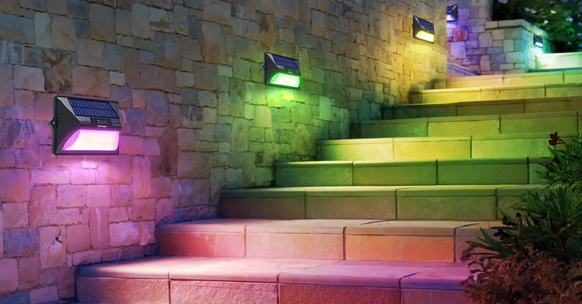 Color changing solar wall lights illuminating stone staircase and stone wall for outdoor lighting color temperature comparison