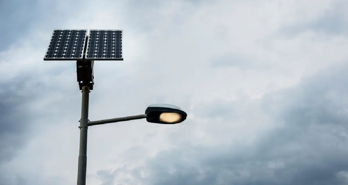 An outdoor solar light with a long cable that allows the solar panel to be placed on a roof to capture maximum light, a strategy for charging when direct sun is limited