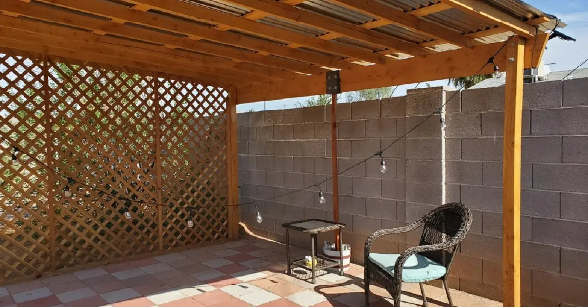 solar security light installed on a covered pergola patio post, demonstrating reliable performance in a fully shaded outdoor area