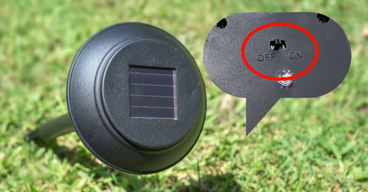 The base of a solar garden light with a magnified callout showing the on/off switch, highlighting that it must be in the 'ON' position to allow the battery to charge.