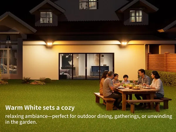 Cozy 3000K warm white solar light setting a relaxing ambiance for a family dining outdoors in the backyard.