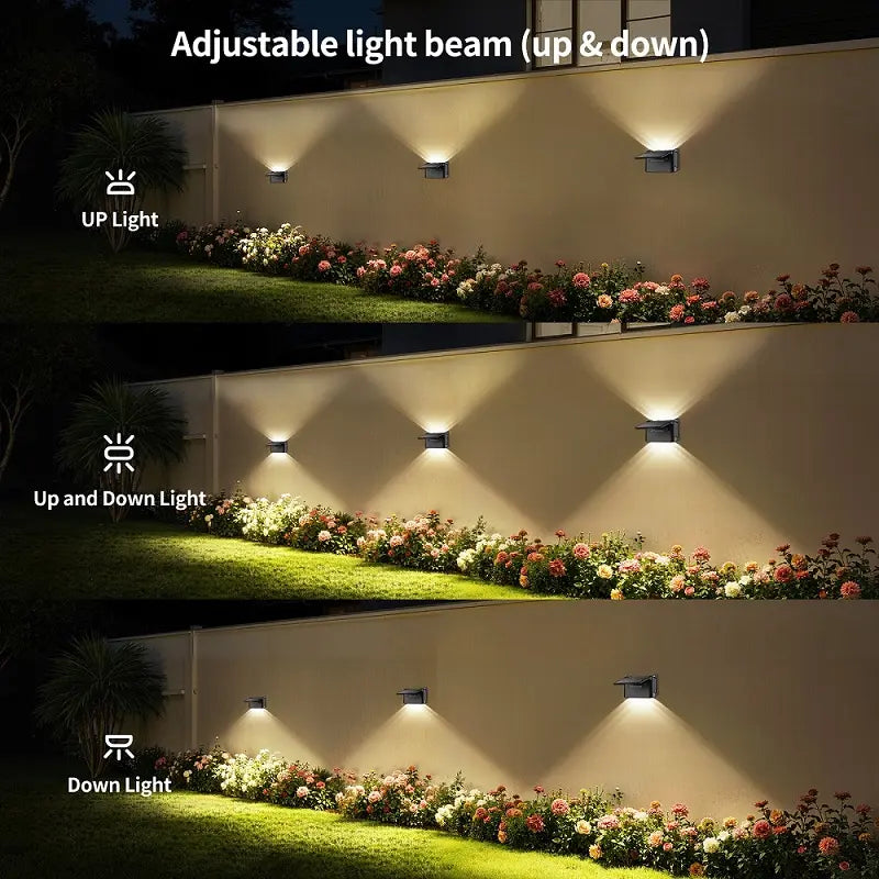 Adjustable solar wall lights mounted on a garden fence, demonstrating three different beam modes: up light only, combined up and down light, and down light only.
