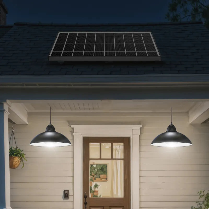 A clear view of the dual solar pendant lights installed on a home's exterior above the front door, with the large solar panel mounted on the roof.